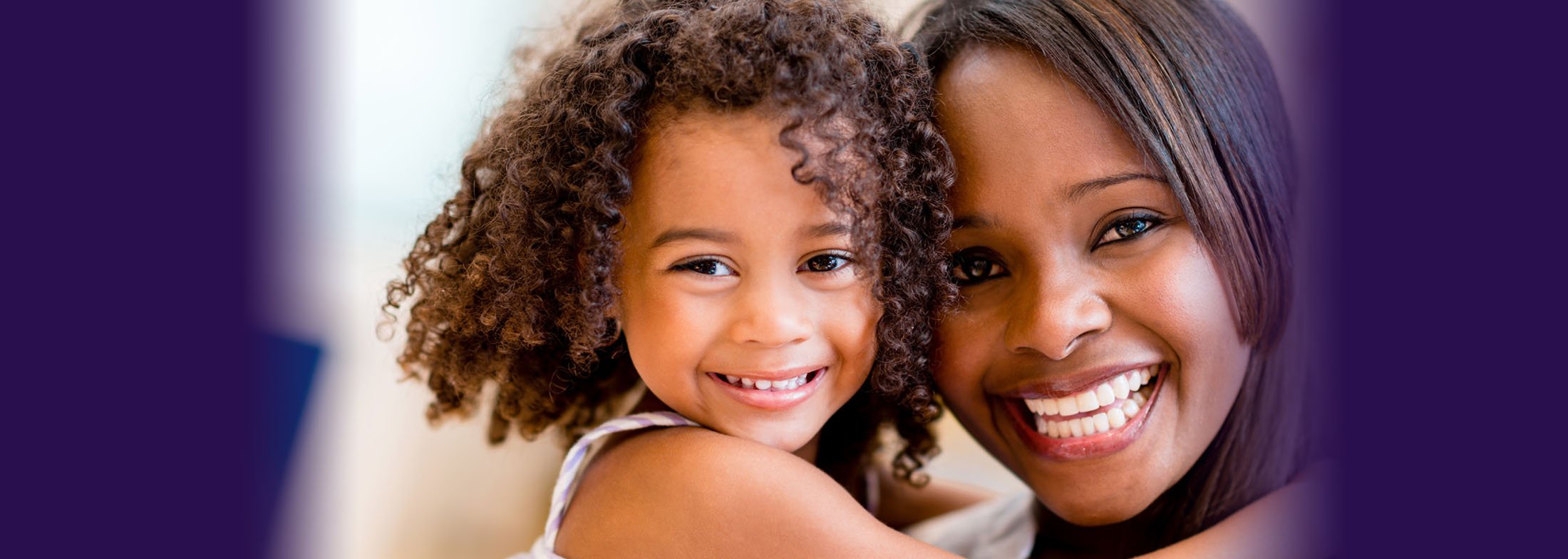 Header image of a mom and her daughter smiling
